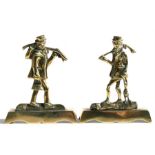 A pair of Victorian brass chimney ornaments in the form of huntsmen, 13cms (5ins) high (2).