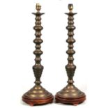 A pair of brass table lamps, 52cms (20.5ins) high.