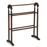 A Victorian mahogany towel rail, 62cms (24.5ins) wide.