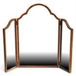 An arched walnut framed triptych dressing table mirror, 92cms (36ins) wide.
