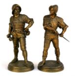 A pair of late 19th century bronze continental figures in the form of armed soldiers, 29cms (11.