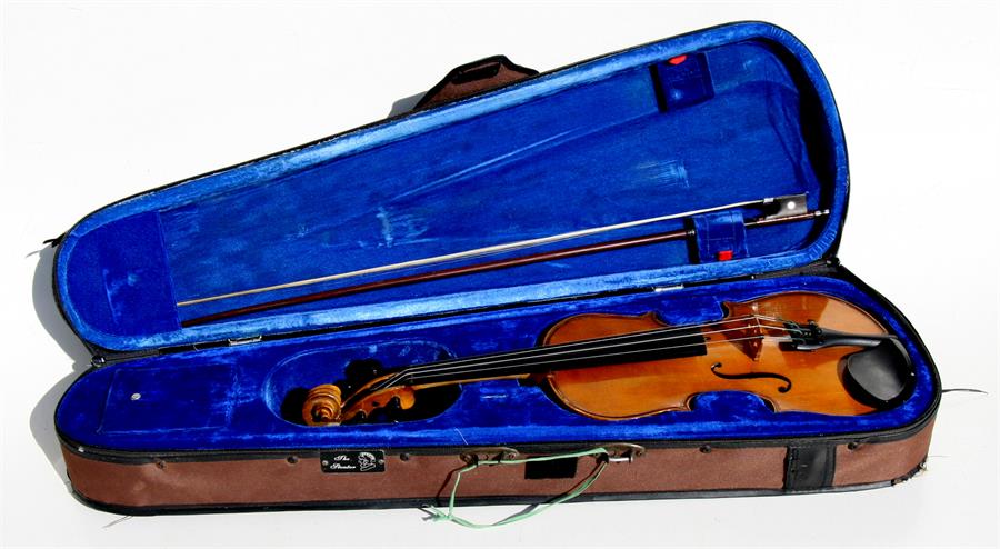 A Stentor three-quarter size student's violin with associated bow and Stentor case.