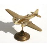 A brass model of the WWII Bristol Beaufighter mounted on a brass base, wingspan 21cms (8.25ins).
