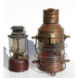 A Davey & Co. copper ships lamp, 47cms (18.5ins) high; together with a vintage brass Tilly lamp.