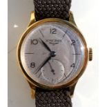 An 18ct gold cased gentleman's Longines wristwatch, the silvered dial with baton and Arabic