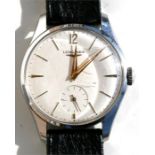 A gentleman's stainless steel case Longines wrist watch with cream dial and subsidiary seconds