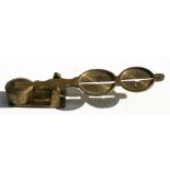 A set of brass sovereign scales, 10cms (4ins) long.
