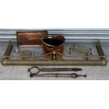 A brass fire fender; a copper coal scuttle; a set of steel fire irons and other items.