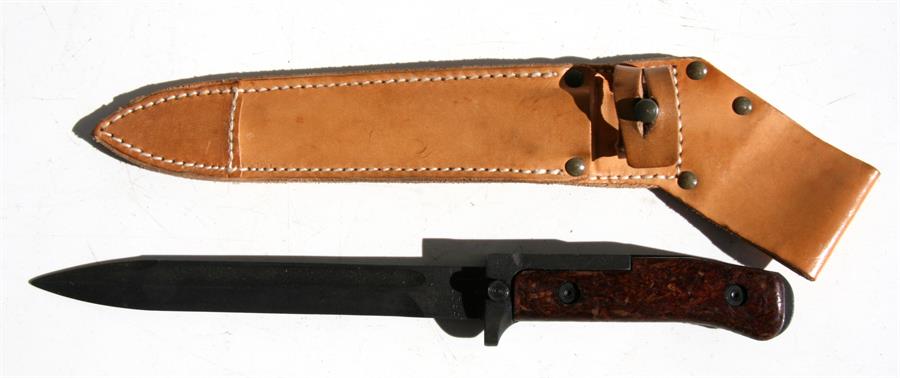 A Czech knife bayonet in its leather scabbard. Blade length 17.5cms (7ins)