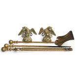 A set of 19th century brass fire irons; together with a pair of brass fire dogs in the form of