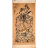 A Chinese scroll painting depicting an emperor and his attendants, with calligraphy, 91cms by 175cms