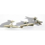 Three WW2 Royal Air Force Spitfire sweetheart brooches. Largest wingspan 4cms (1.5ins)
