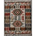 A John Lewis handmade Kelim rug with geometric design, 120 by 180cms (47.25 by 71ins).
