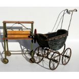 A child's Triang toy mangle; together with a painted wooden dolls pram (2).