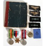 A Royal Air Force WW2 medal group of three with cap badge, trade badges etc, a pass from RAF