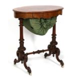 A Victorian burr walnut sewing table, the hinged top enclosing a fitted interior with well, raised