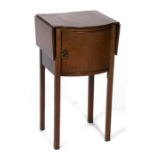 An Edwardian mahogany bow fronted pot cupboard with drop flaps, standing on square chamfered legs,