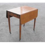 A 19th century mahogany Pembroke table on square tapering legs, 73cms (28.75ins) wide.