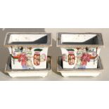 A pair of Chinese famille rose rectangular form small planters on stands decorated with figures with
