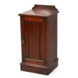 A late 19th century walnut pot cupboard with tramline moulding, 41cms (16ins) wide.