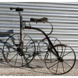 A late 19th / early 20th century child's metal trike.