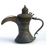 A Turkish / Islamic dallah coffee pot, 19.5cms (7.6ins) high.