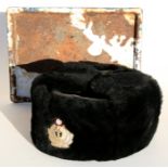 A Russian Navy ushanka hat and a Cold War era USSR enamel sign. 22cms (8.5ins) by 30cms (12ins)