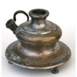 An Indian silvered bronze hooker base inscribed with Sanskrit & foliate scrolls, 12cms (4.75ins)