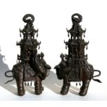 A pair of Chinese bronze censers in the form of elaborately caparisoned elephants, 37cms (14.5ins)