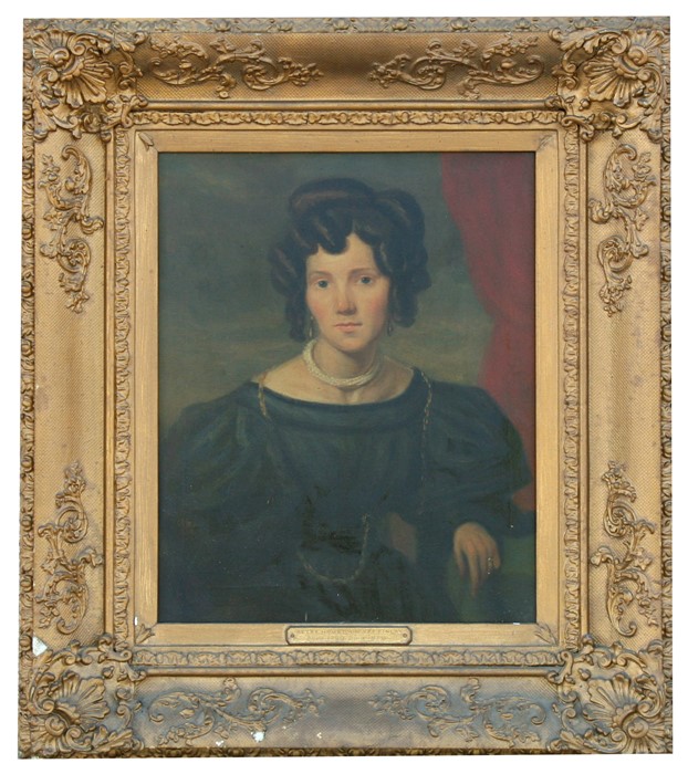 A Victorian portrait of a young lady, framed (possibly an oleograph) 28 by 36cms (11 by 14ins).