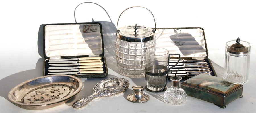 A silver Capstan inkwell; a silver backed hand mirror and other silver & silver plated items.