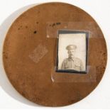 A WW1 Memorial Plaque named to Harry Gardner with a photograph of him stuck to the reverse. 241899