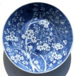 A blue & white prunus decorated charger, 36cms (14ins) diameter.Condition ReportGood condition