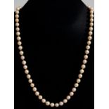 A knotted pearl necklace with 9ct gold clasp, 55cms (21.75ins) long.Condition ReportEach pearl 6mm