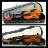 A two-piece backed violin and bow, bears spurious label Stradivarius, cased, 59cms (23.25ins)