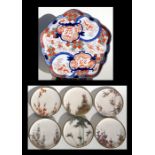 Six Japanese Satsuma plates decorated with flowers and gilt highlights, 23cms (9ins) diameter;