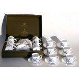 A boxed set of Royal Worcester coffee cans & saucers; together with seven unboxed matching coffee