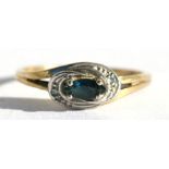 A 9ct gold sapphire and diamond ring, approx UK size 'O'.