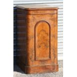 A Victorian figured walnut pedestal cupboard, on plinth base, 43cms (17ins) wide.