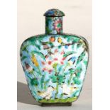 A Chinese enamel snuff bottle decorated with flowers and birds, 8cms (3.1ins) high.