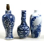A Chinese blue & white bottle vase decorated with a dragon amongst clouds, 25.5cms (10ins) high;
