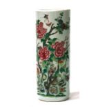 A Chinese famille rose stick stand decorated with flowers and foliage, 61cms (24ins) high.