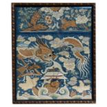 A Chinese silk and bullion wire embroidered panel depicting a dragon, chilong and fish, framed &