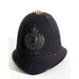 A Somerset Constabulary policeman's helmet, 19cms (7.5ins) high.