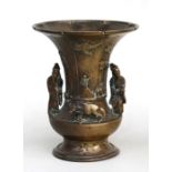 A Chinese Ming bronze Gu vase decorated with figures and a water buffalo, 17.7cms (7ins) high.