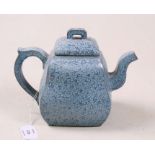 A Chinese Yixing pottery teapot with mottled blue glaze, impressed seal mark to underside, 16cms (