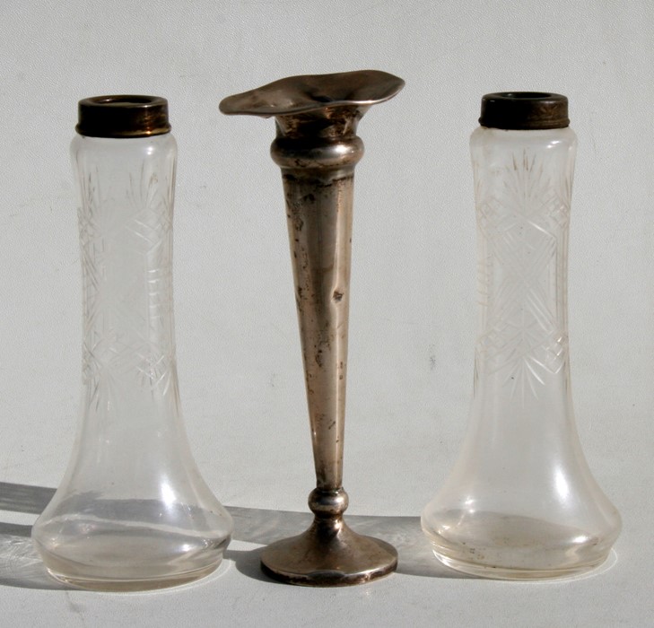 A silver trumpet vase; together with a pair of silver mounted vases.