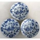 Three 18th century Chinese blue & white plates decorated with ladies on a terrace and workers within