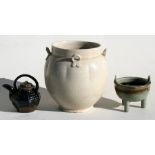 A Chinese miniature glazed Yixing teapot, 8cms (3.1ins) high; together with a celadon glazed two-