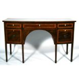A George III mahogany bow fronted sideboard with three frieze drawers above a pair of cupboards,